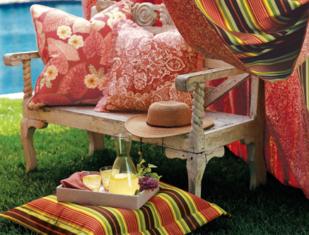 Vibrant colors add life to an antique wood bench.